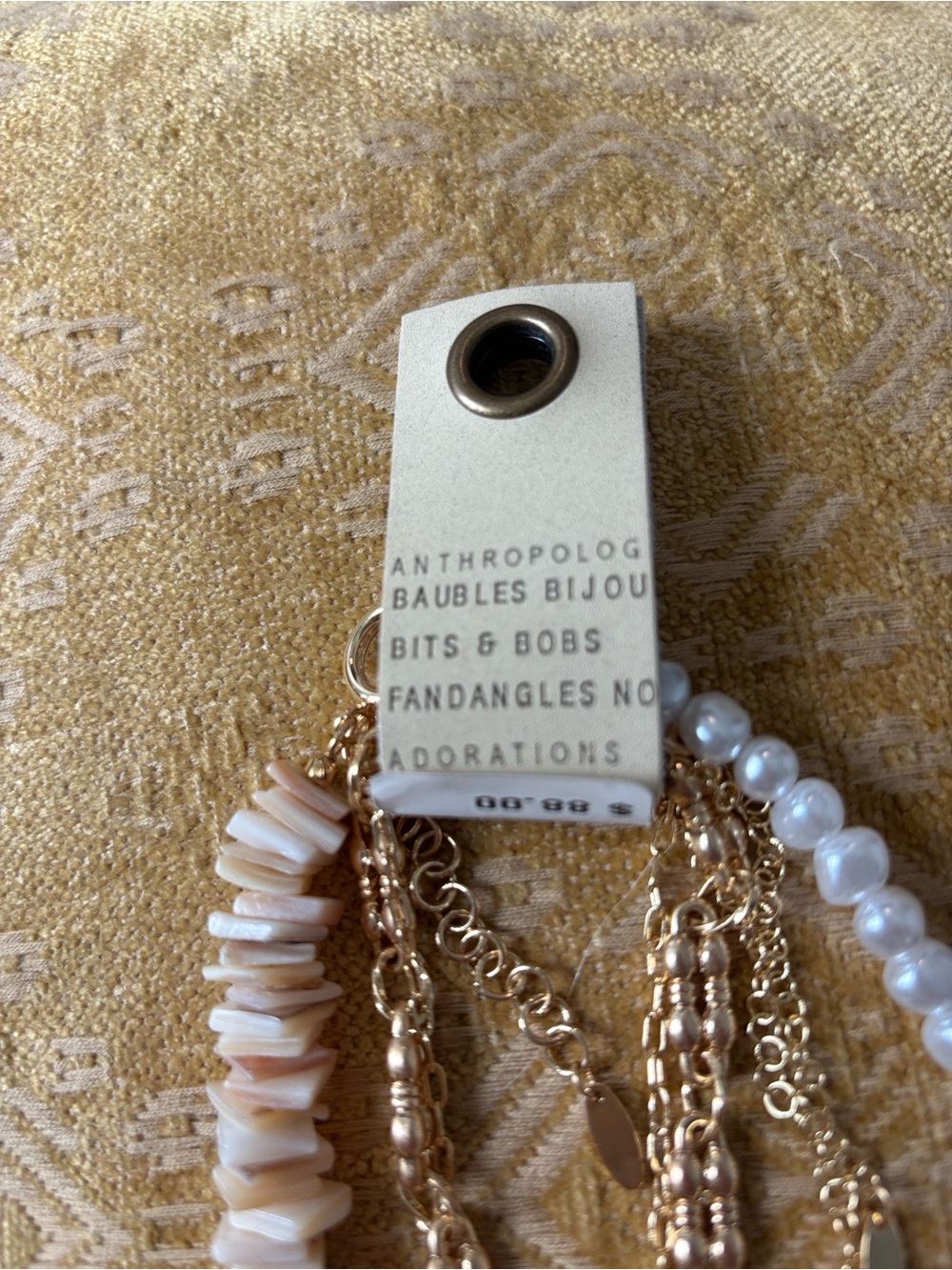 Anthropologie Gold, Cream, and White Layered Pendant Necklace - Picture 3 of 3